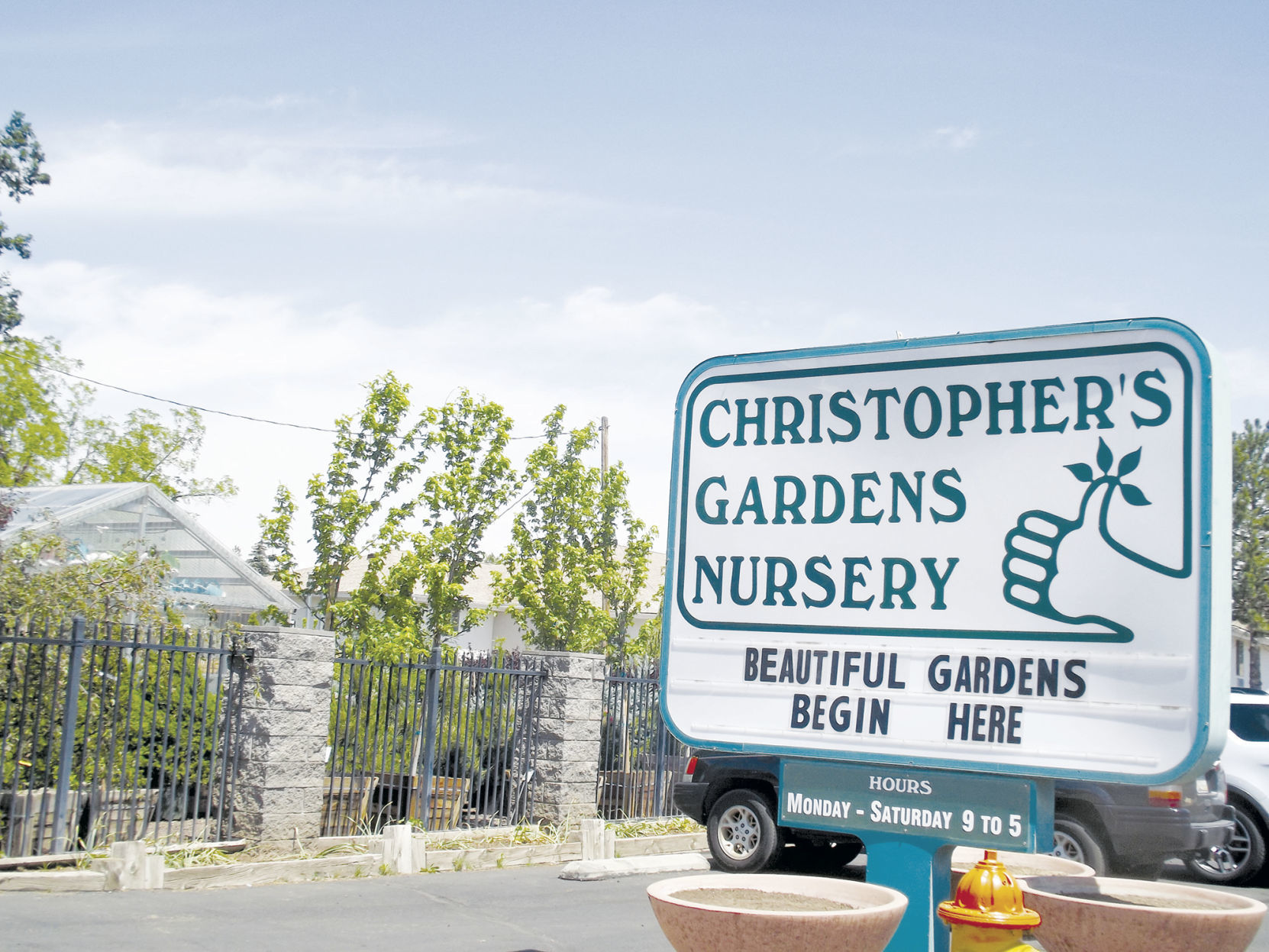 Local businesses speak out about lockdown effects - Christopher's Garden sign
